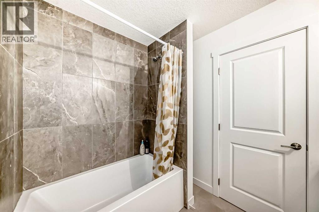 205, 33 Merganser Drive W, Chestermere, Alberta  T1X 2S2 - Photo 45 - A2281064