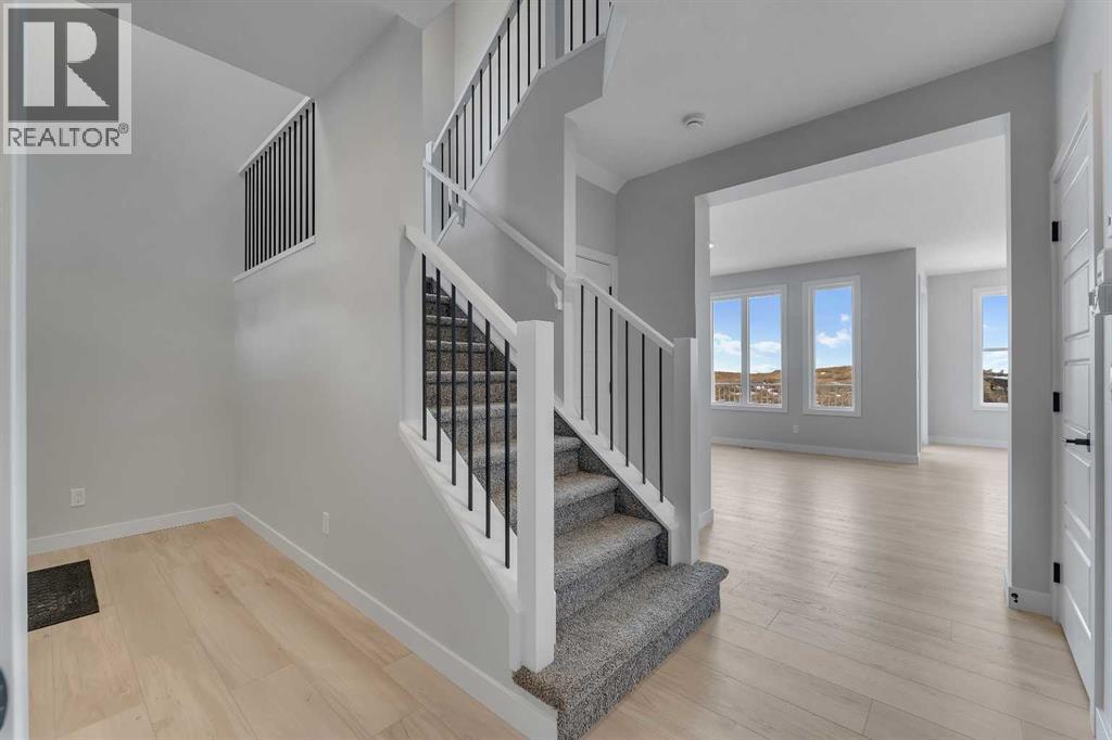 1172 Iron Ridge Avenue, Crossfield, Alberta  T0M 0S0 - Photo 4 - A2268768