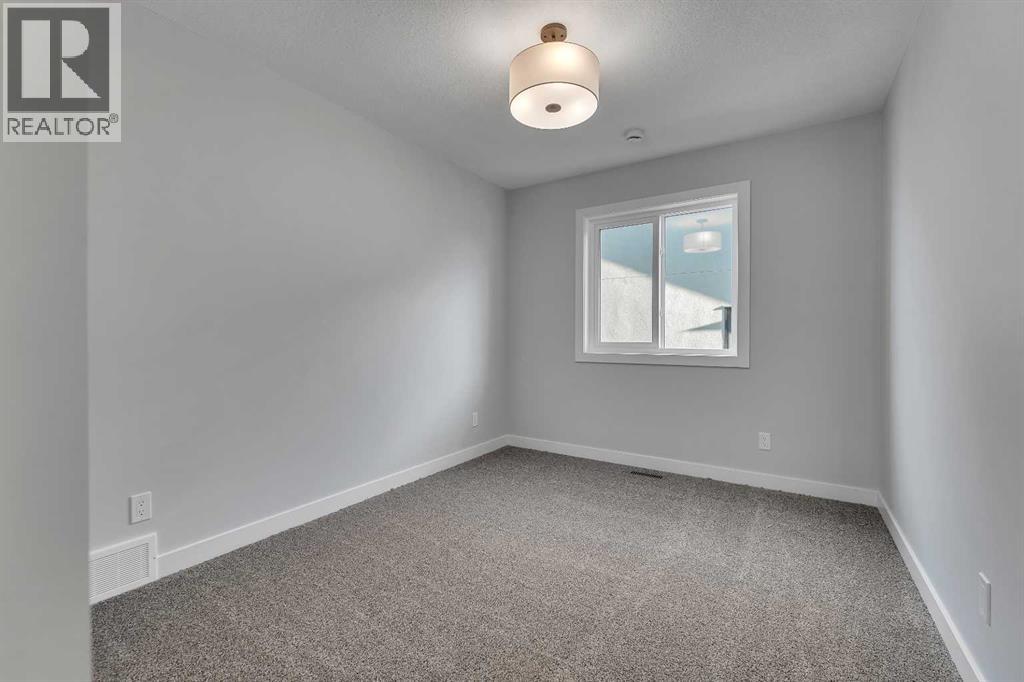 1172 Iron Ridge Avenue, Crossfield, Alberta  T0M 0S0 - Photo 24 - A2268768