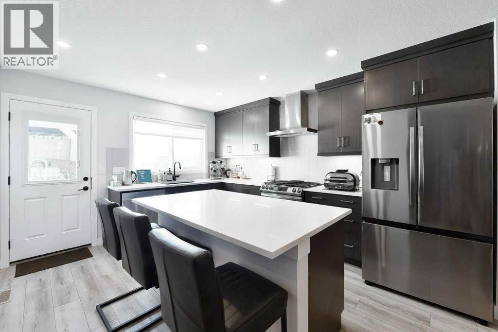 207 Aquila Way Nw, Calgary, Alberta  T3R 1Z8 - Photo 9 - A2272353