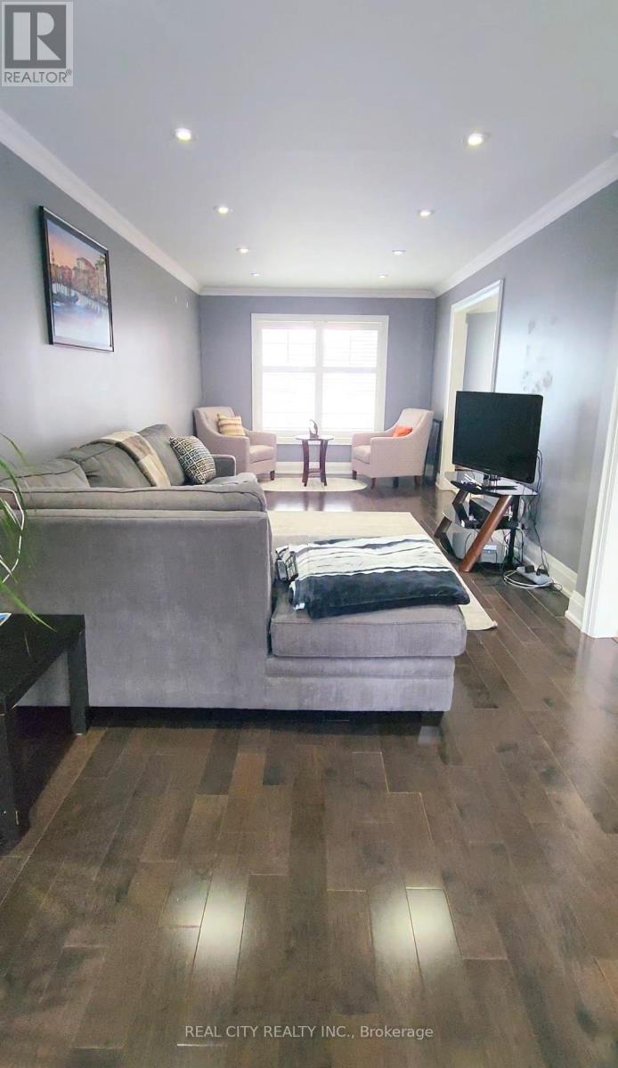 229 Kingsbridge Garden Circle, Mississauga, Ontario  L5R 1L4 - Photo 4 - W12741002