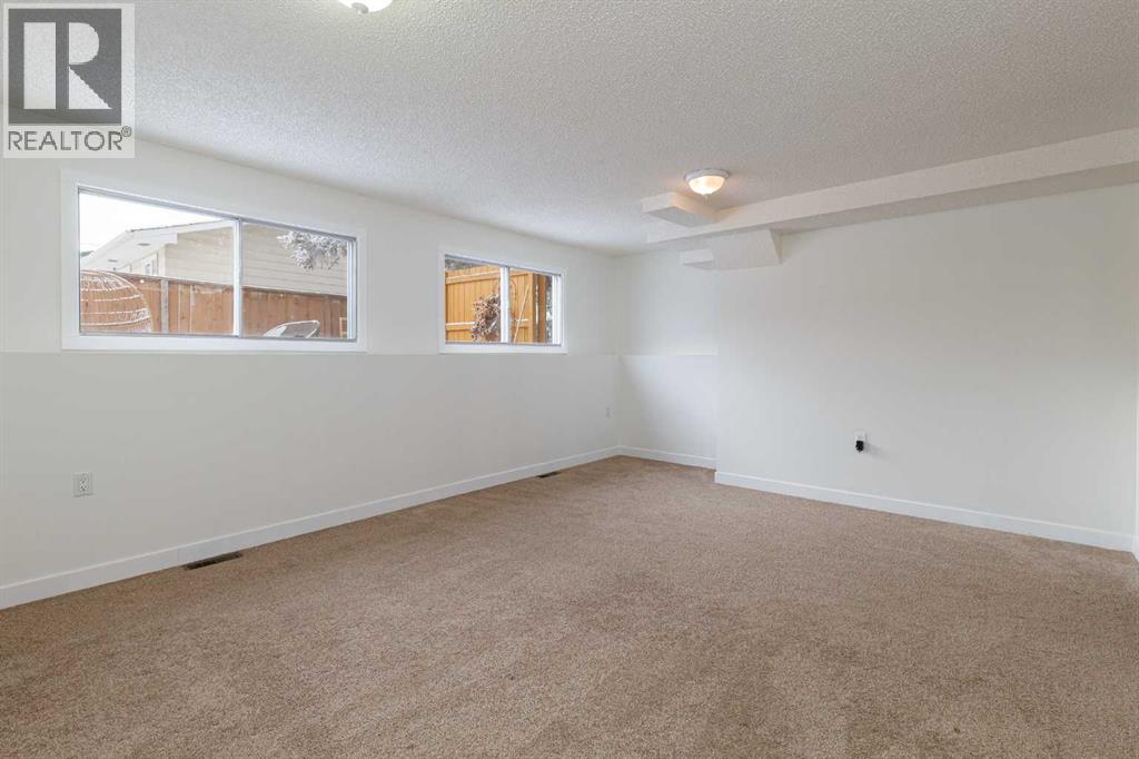 256 Queen Tamara Way Se, Calgary, Alberta  T2J 4E7 - Photo 32 - A2278377