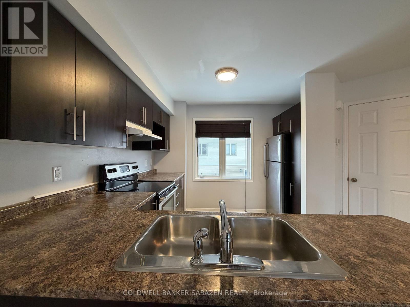 203 Kennevale Drive, Ottawa, Ontario  K2J 0C3 - Photo 12 - X12741150