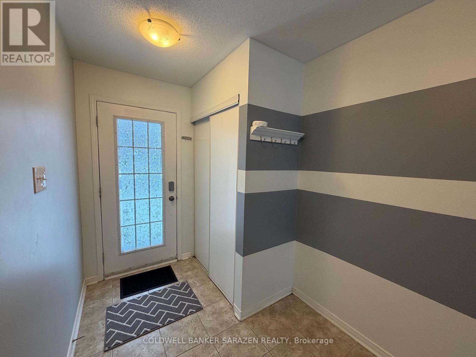 203 Kennevale Drive, Ottawa, Ontario  K2J 0C3 - Photo 3 - X12741150