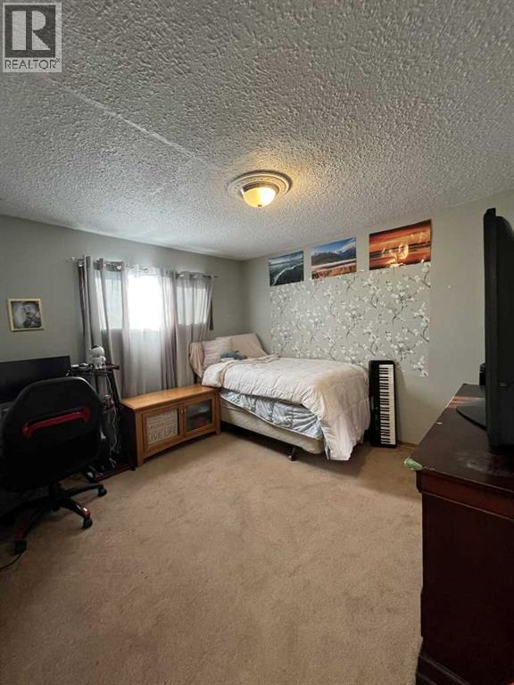 4915 57 Avenue, Taber, Alberta  T1G 1E5 - Photo 11 - A2273339