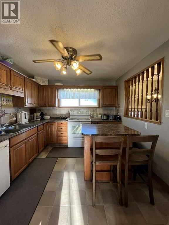 4915 57 Avenue, Taber, Alberta  T1G 1E5 - Photo 4 - A2273339