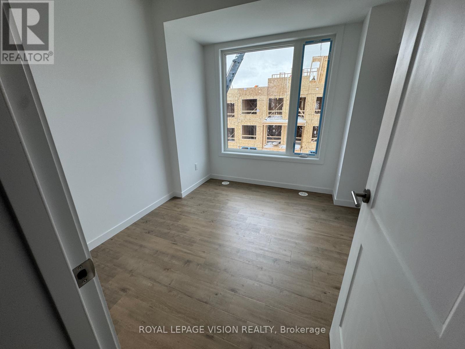 18 - 113 Marydale Avenue, Markham, Ontario  L3S 0E3 - Photo 4 - N12741290