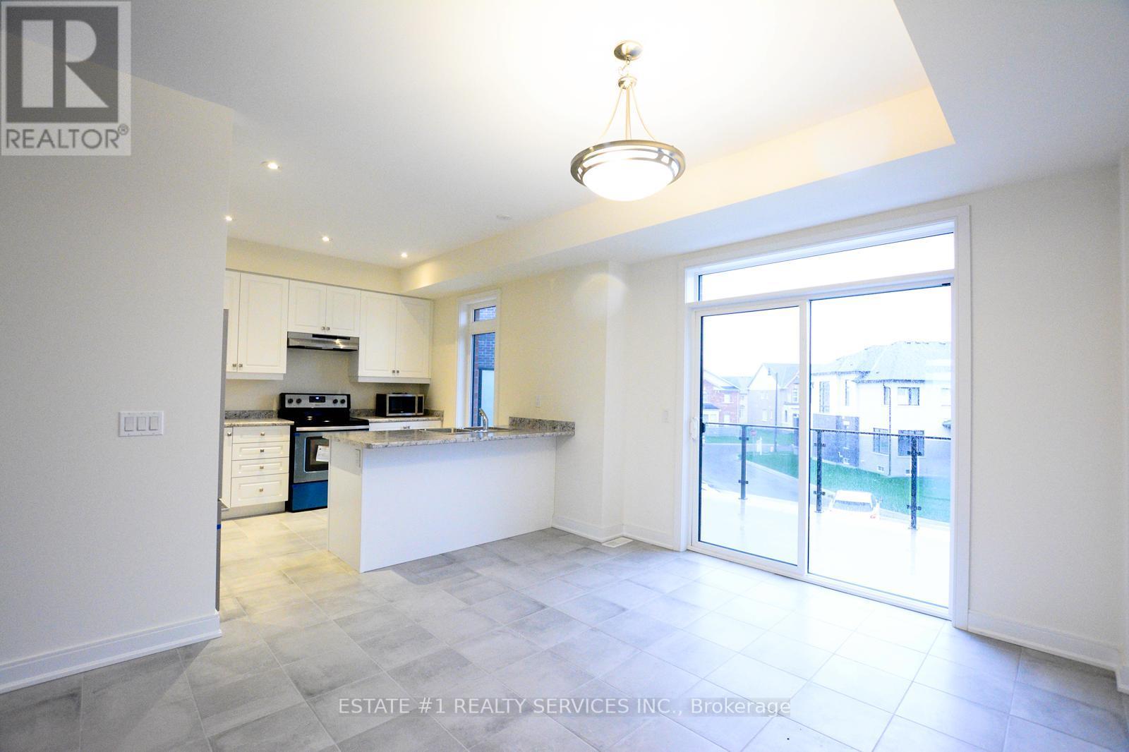 357 Veterans Drive, Brampton, Ontario  L7A 4W1 - Photo 5 - W12741464