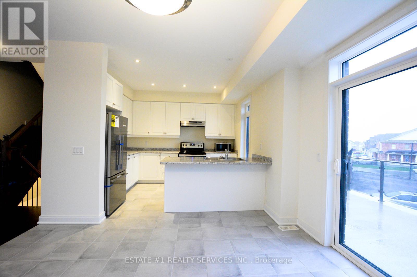 357 Veterans Drive, Brampton, Ontario  L7A 4W1 - Photo 6 - W12741464