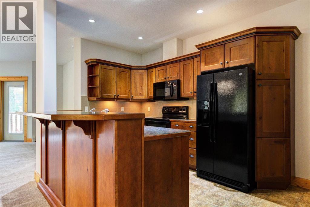 215, 155 Crossbow Place, Canmore, Alberta  T1W 3H6 - Photo 4 - A2262256