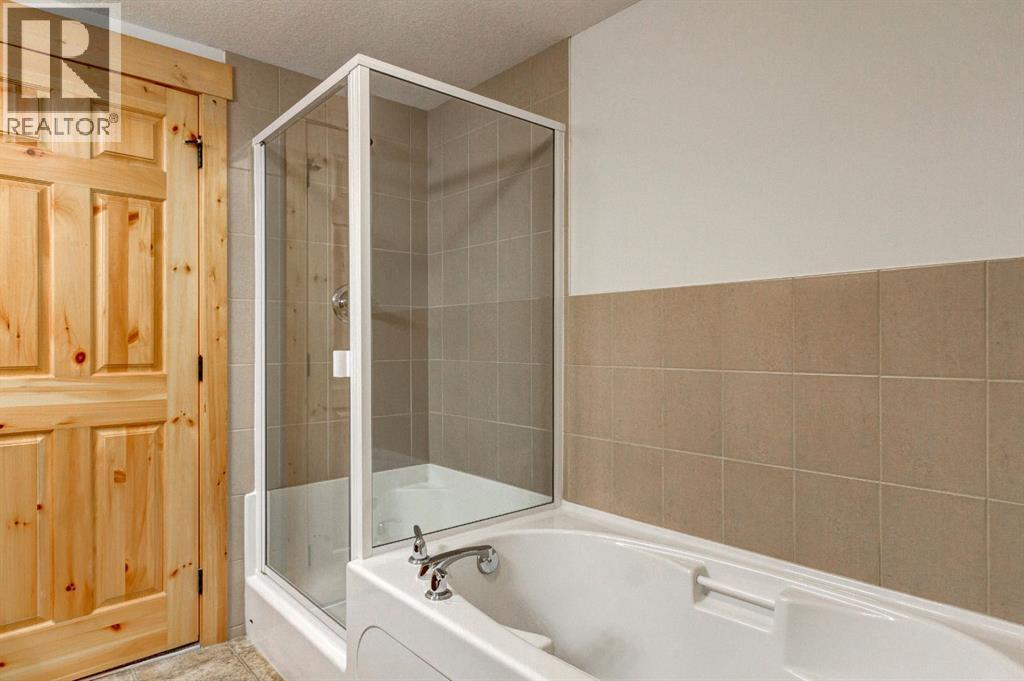 215, 155 Crossbow Place, Canmore, Alberta  T1W 3H6 - Photo 21 - A2262256