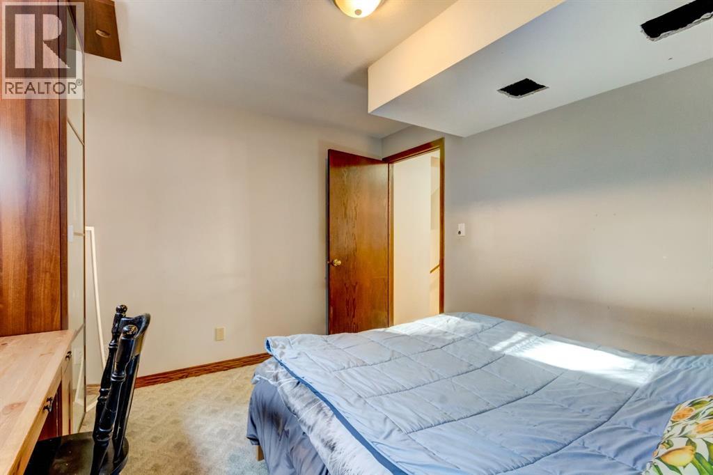 303 Pioneer Road, Canmore, Alberta  T1W 1E8 - Photo 21 - A2268124