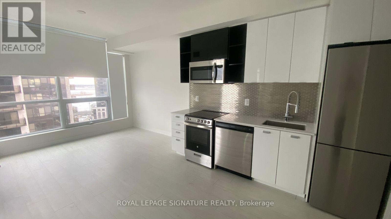 1112 - 10 De Boers Drive, Toronto, Ontario  M3J 0H1 - Photo 3 - W12738178