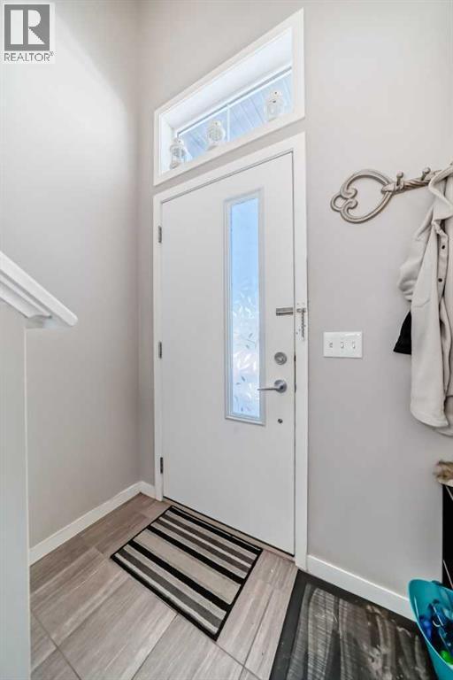 656 Copperpond Boulevard Se, Calgary, Alberta  T2Z 5B9 - Photo 4 - A2282104