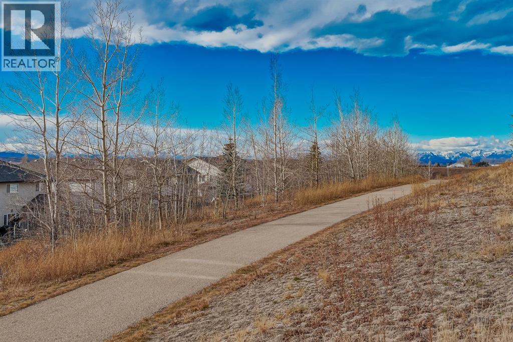 203 Sunset Circle, Cochrane, Alberta  T4C 0C8 - Photo 46 - A2277554