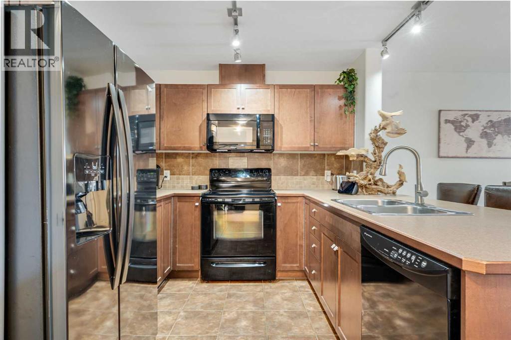 1315, 92 Crystal Shores Road, Okotoks, Alberta  T1S 2M8 - Photo 3 - A2281716