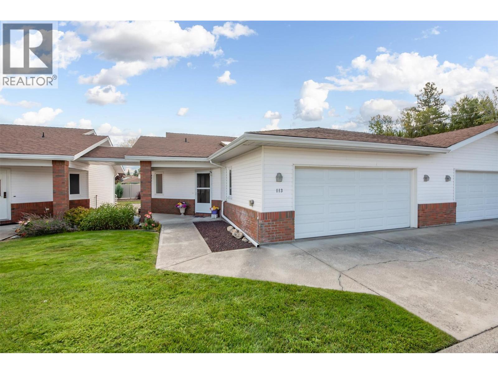 IS THIS KELOWNA'S BEST 55+ VALUE? READY FOR IMMEDIATE POSSESSION. Welcome to Pennington Court – where lifestyle meets functionality in this sought-after 55+ community just steps from Mission Creek Park, Costco, shops, dining, and transit. This beautifully maintained half duplex bungalows offer 2,300+ sq. ft. of finished living space, ideal for downsizing without compromise. Enjoy a double garage with extra driveway parking, main-floor laundry, private patio, and a bright open layout with gleaming hardwood, and vaulted ceilings. The kitchens features three appliances, and sensible layout, while the spacious primary suite easily fits a king-sized bed and boasts a full ensuite. Lower levels offer expansive rec rooms, guest bedrooms, hobby or office areas, and abundant storage. Major upgrades include poly-B replacement, newer windows, appliances, furnace, hot water tank, and more. With manicured common areas, low strata fees, and a friendly, pride-filled neighbourhood, Pennington Court blends the privacy of a detached home with the convenience of strata living. (id:48254)