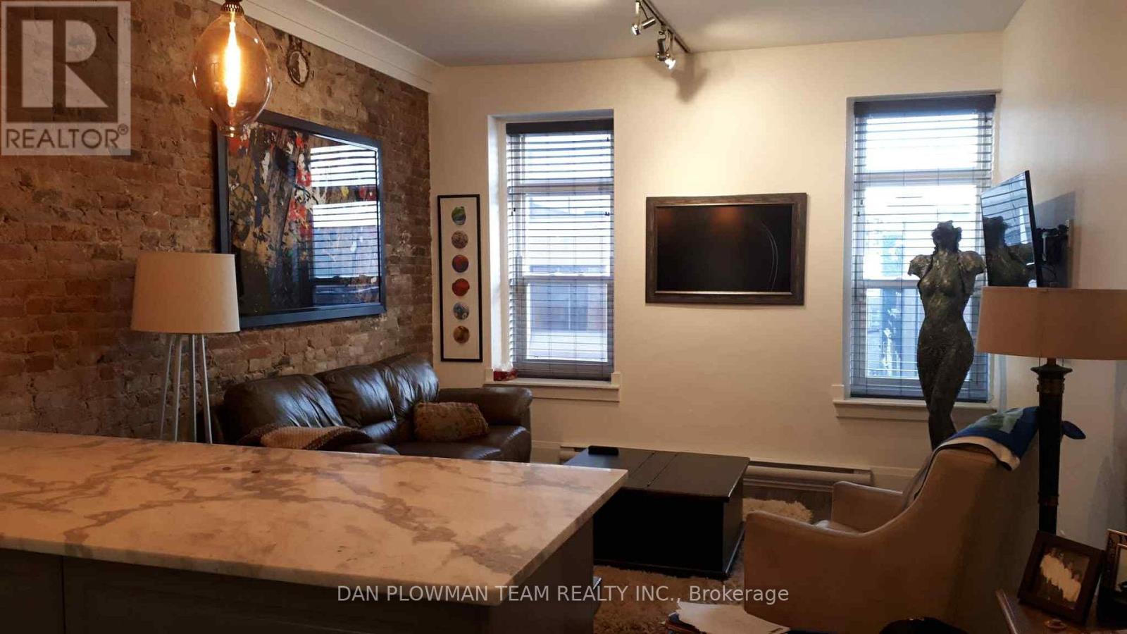 307 - 8 Simcoe Street N, Oshawa, Ontario  L1G 4R8 - Photo 1 - E12743030