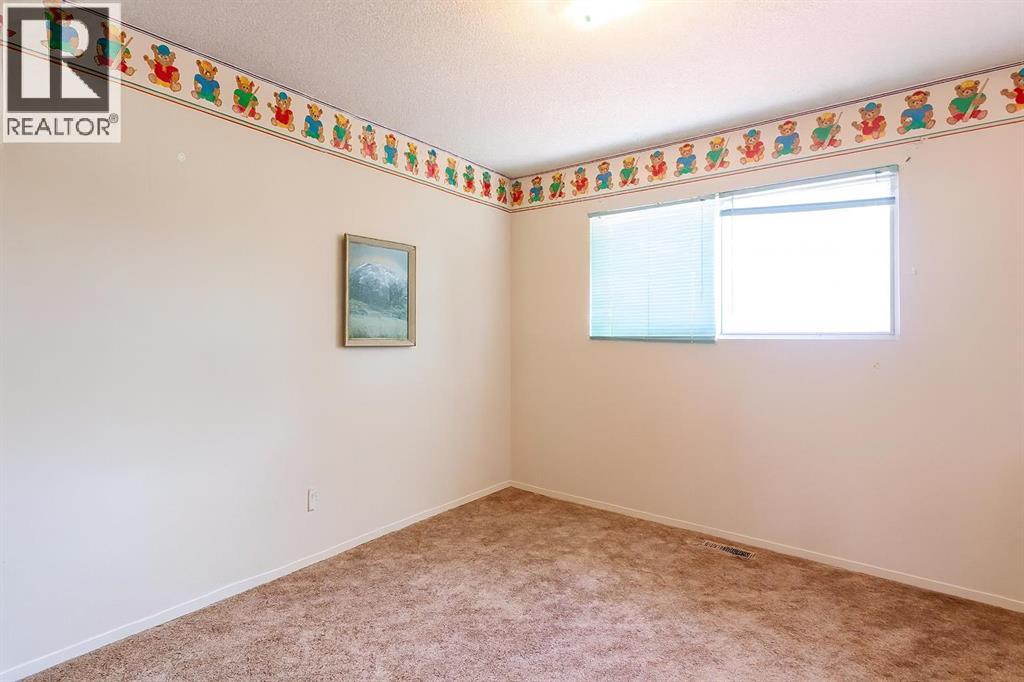 7803 Hunterslea Crescent Nw, Calgary, Alberta  T2K 4M3 - Photo 8 - A2267488