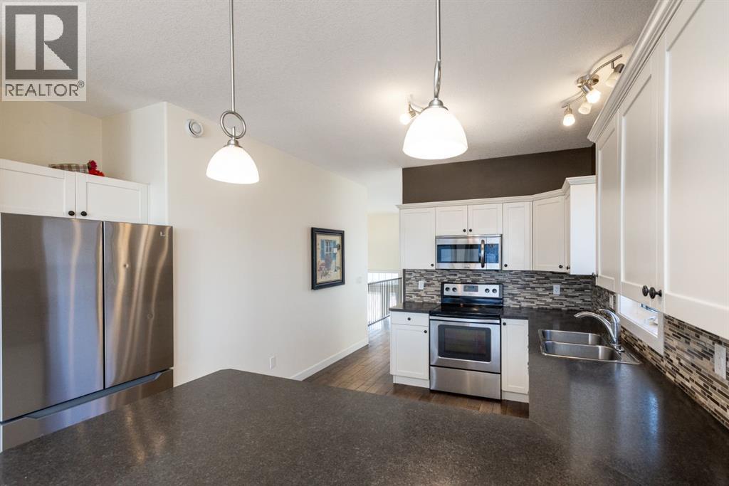 6453 Elmwood Way, Innisfail, Alberta  T4G 0A4 - Photo 10 - A2279505