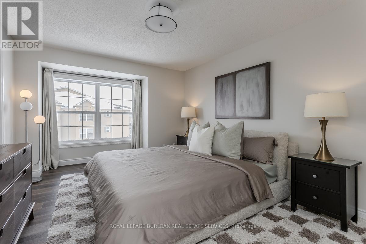 401 - 1450 Bishops Gate, Oakville, Ontario  L6M 4N1 - Photo 14 - W12743126