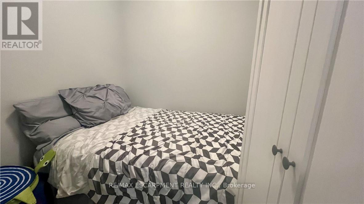 408 - 128 Grovewood Common, Oakville, Ontario  L6H 0X3 - Photo 11 - W12743222