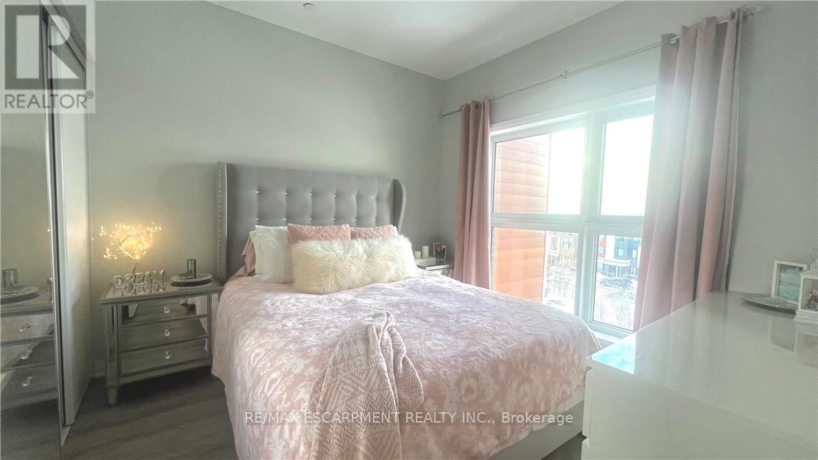 408 - 128 Grovewood Common, Oakville, Ontario  L6H 0X3 - Photo 7 - W12743222