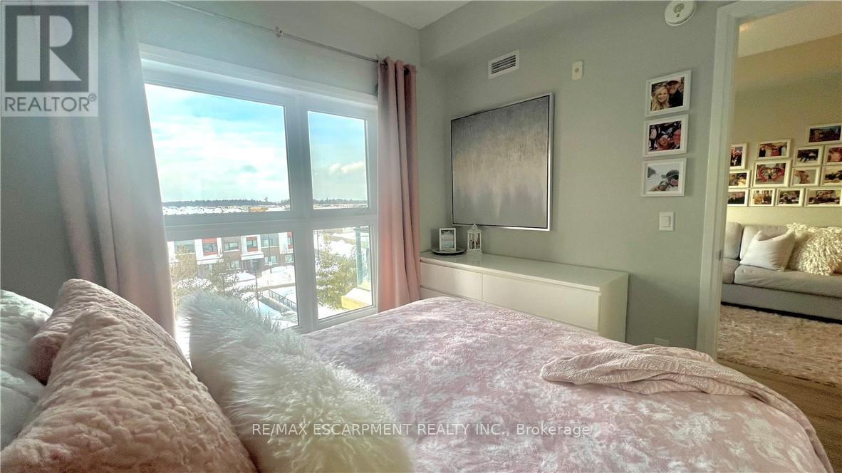 408 - 128 Grovewood Common, Oakville, Ontario  L6H 0X3 - Photo 9 - W12743222