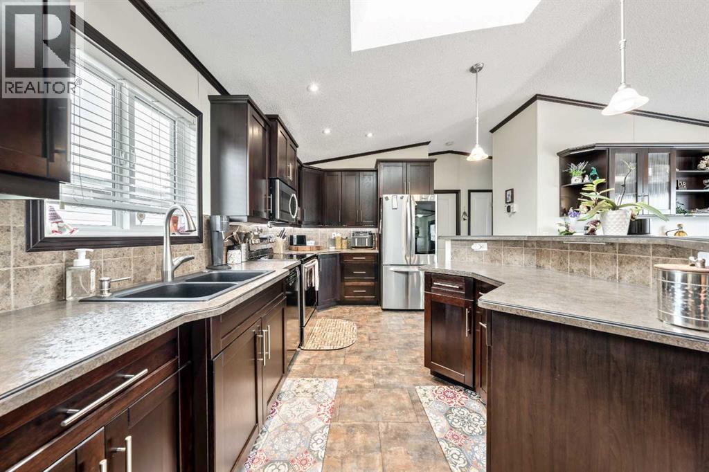 4 Spring Dale Circle Se, Airdrie, Alberta  T4A 1N8 - Photo 5 - A2282122