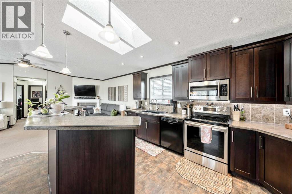 4 Spring Dale Circle Se, Airdrie, Alberta  T4A 1N8 - Photo 6 - A2282122