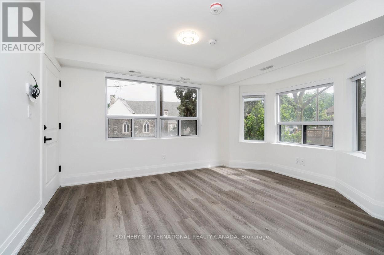 B - 44 Larkin Avenue, Toronto, Ontario  M6S 1L8 - Photo 3 - W12743308