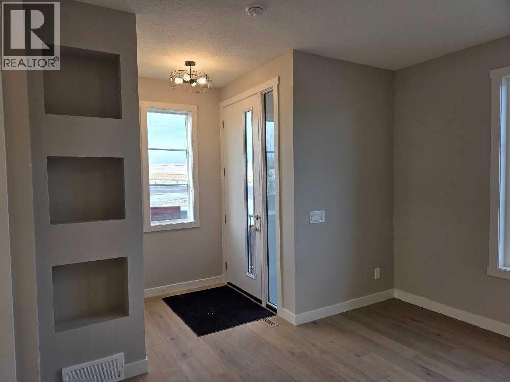 105 Cobbestone Gate Sw, Airdrie, Alberta  T4B 0R7 - Photo 4 - A2274503