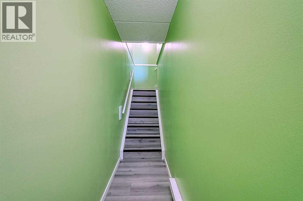 206, 2200 Woodview Drive Sw, Calgary, Alberta  T2W 3N6 - Photo 5 - A2278836