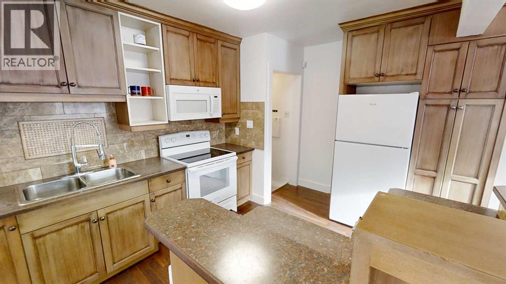 1505 8 Avenue S, Lethbridge, Alberta  T1J 1R4 - Photo 7 - A2282494