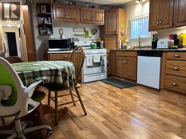 56 Greenbrook Village E, Brooks, Alberta  T1R 0R7 - Photo 6 - A2281966