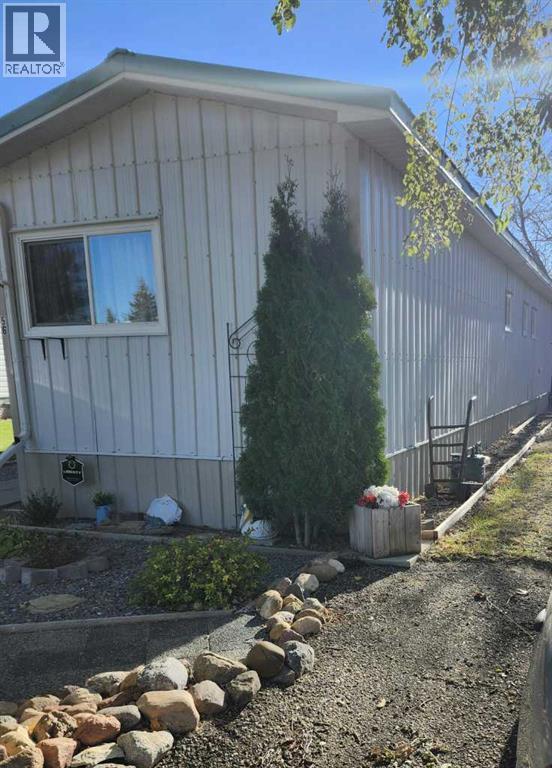 56 Greenbrook Village E, Brooks, Alberta  T1R 0R7 - Photo 3 - A2281966