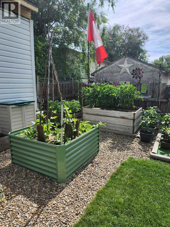 56 Greenbrook Village E, Brooks, Alberta  T1R 0R7 - Photo 38 - A2281966