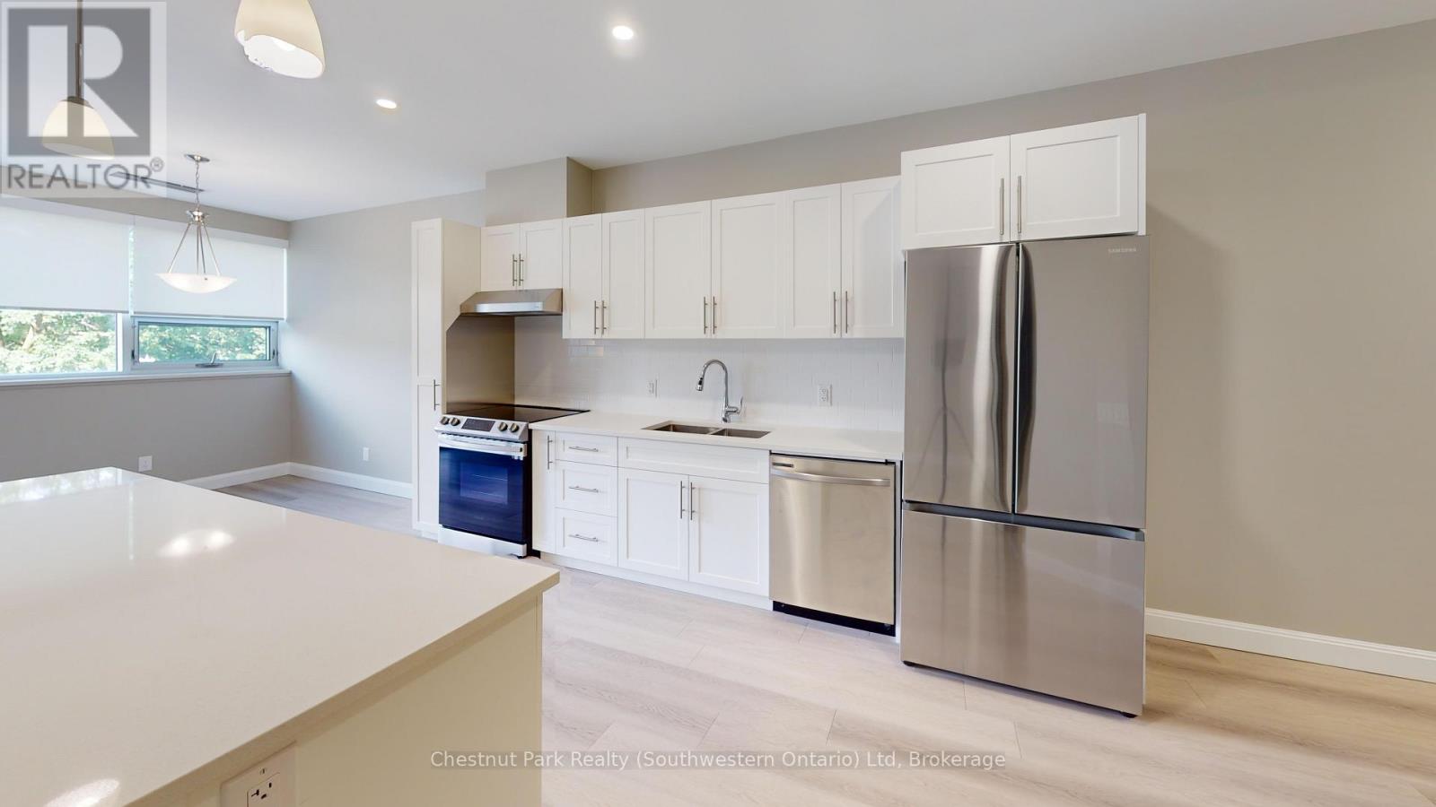 214 - 2 Quebec Street, Guelph (Exhibition Park), Ontario  N1H 2T2 - Photo 1 - X12744364