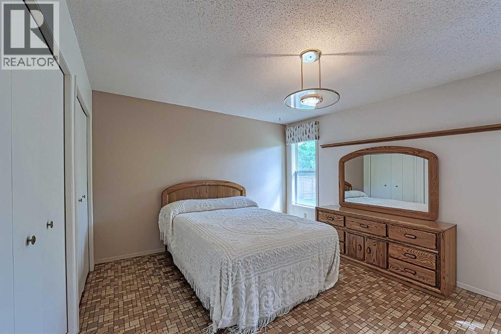 21 Welch Crescent, Okotoks, Alberta  T1S 1H2 - Photo 13 - A2267390