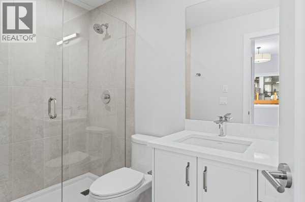 203j, 209 Stewart Creek Rise, Canmore, Alberta  T1W 0N9 - Photo 11 - A2259828