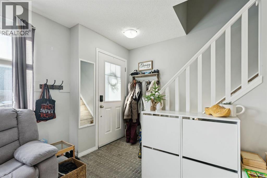 996 Windsong Drive Sw, Airdrie, Alberta  T4B 0P2 - Photo 4 - A2281750