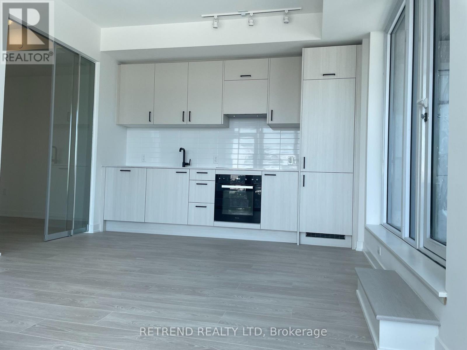 1002 - 1 Quarrington Lane, Toronto, Ontario  M3C 0S4 - Photo 3 - C12744580