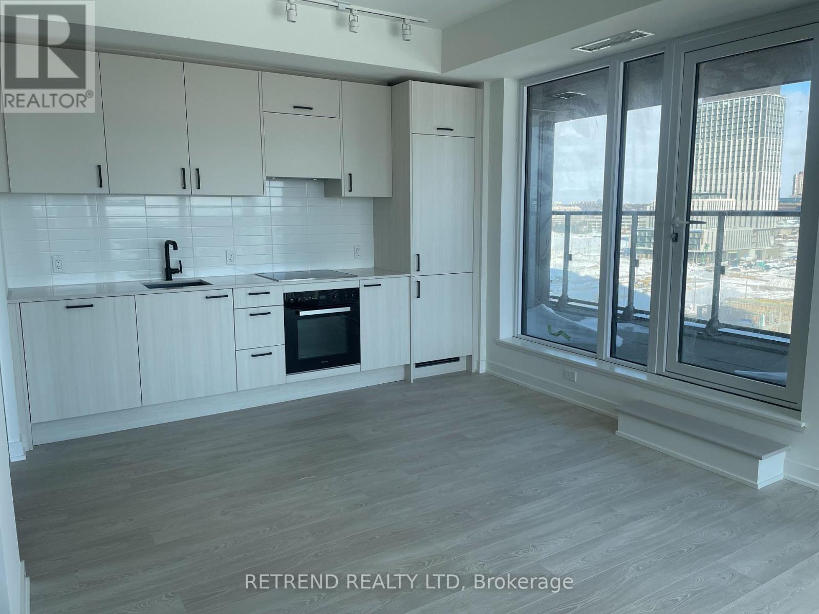 1002 - 1 Quarrington Lane, Toronto, Ontario  M3C 0S4 - Photo 4 - C12744580