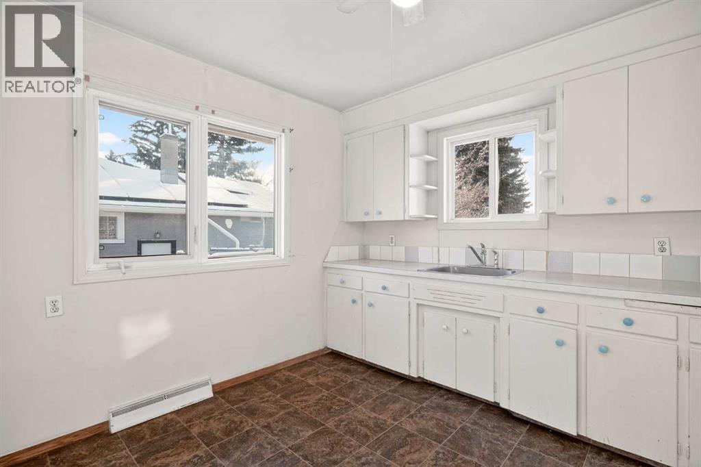 44 Winslow Crescent Sw, Calgary, Alberta  T3C 2R1 - Photo 11 - A2276396