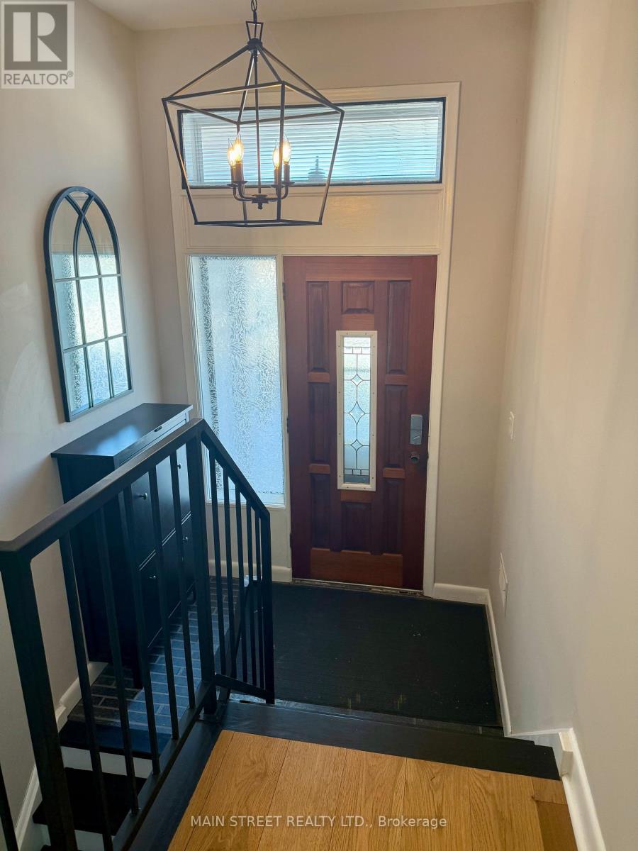 49 Poynter Drive, Toronto, Ontario  M9R 1L3 - Photo 2 - W12745038