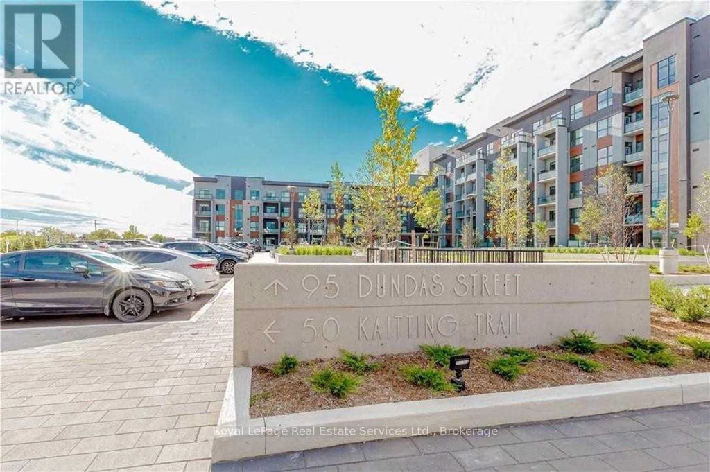 420 - 95 Dundas Street W, Oakville, Ontario  L6M 5N4 - Photo 2 - W12745092