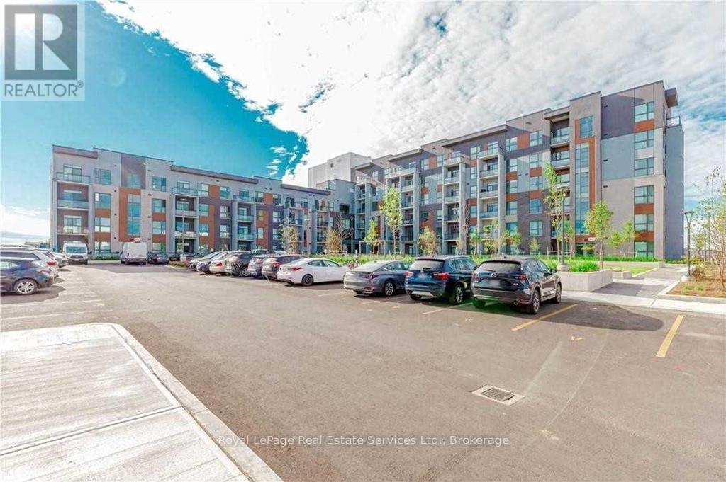 420 - 95 Dundas Street W, Oakville, Ontario  L6M 5N4 - Photo 3 - W12745092