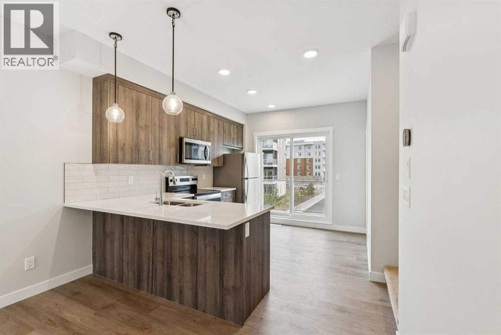 107 Shawnee Square Sw, Calgary, Alberta  T2Y 0W4 - Photo 1 - A2268566