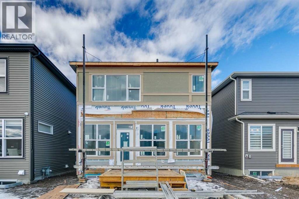 142 Belmont Passage Sw, Calgary, Alberta  T0L 0X0 - Photo 4 - A2276433