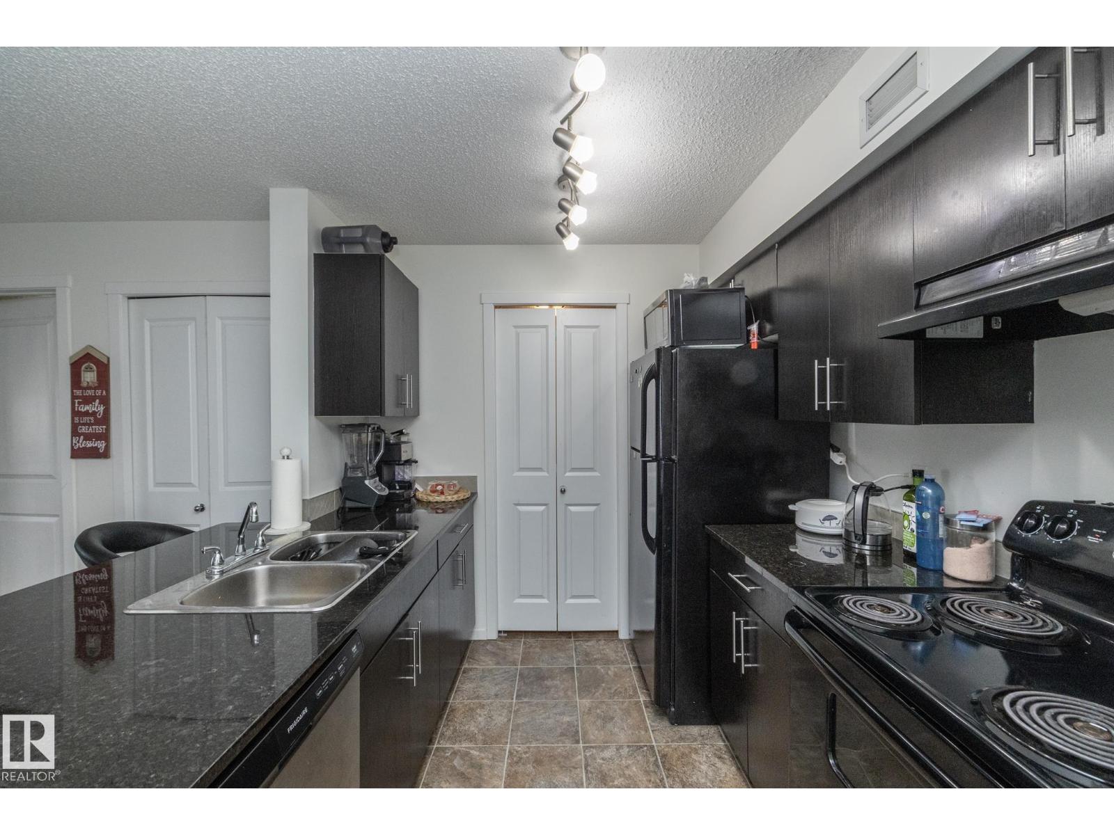 #215 5810 Mullen Pl Nw, Edmonton, Alberta T6R 0W3 - Photo 6 - E4471726
